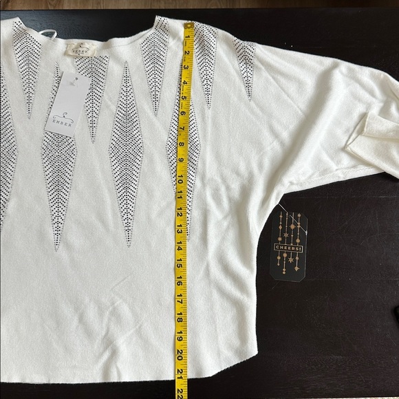 Festive cream sweater with contemporary sparkle icicles or diamonds. - Picture 10 of 11